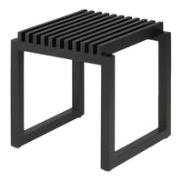 Black wooden side table with striped top and open frame design, ideal for modern decor.
