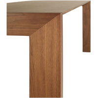 Wooden table corner with warm brown tones and a smooth, clean finish. Minimalistic design and natural patterns.