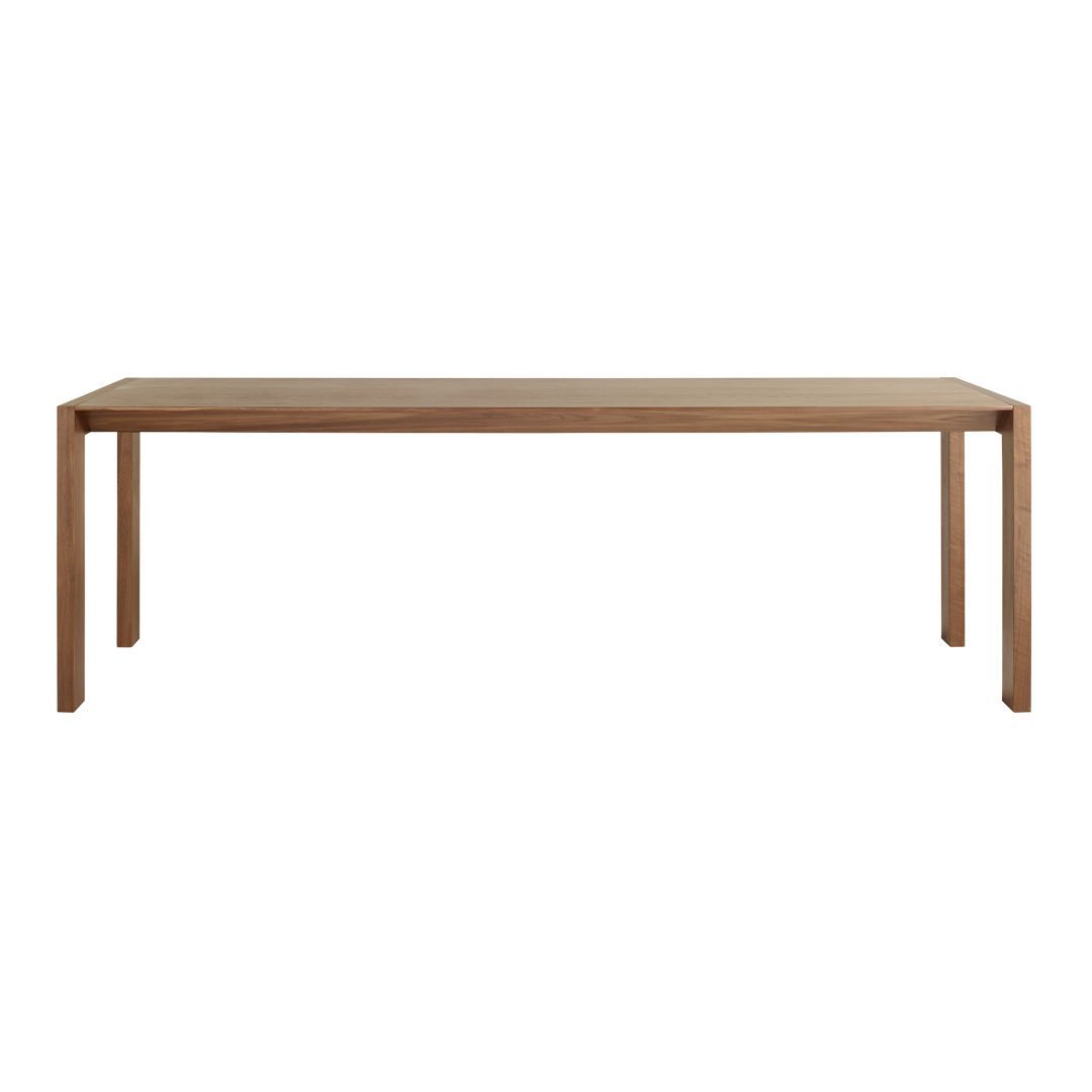 Natural wood dining table in warm oak finish, featuring a sleek, minimalist design with smooth grain patterns.