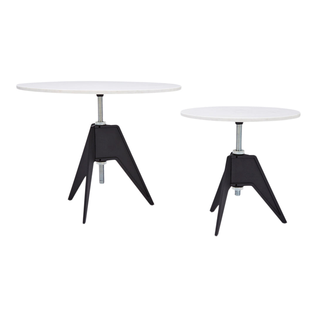 White round tabletops with black tripod bases, featuring a sleek, modern design. Perfect for contemporary decor.
