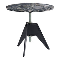 Black round table with a speckled stone top and contrasting black geometric legs. Perfect for modern decor.