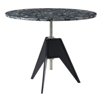 Round table with a speckled blue and gray top and a sleek black tripod base. Ideal for modern decor.