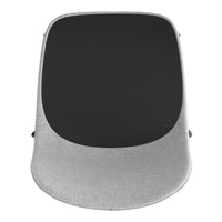Gray upholstered chair with a solid black seat and soft, rounded edges, combining minimalist style and comfort.