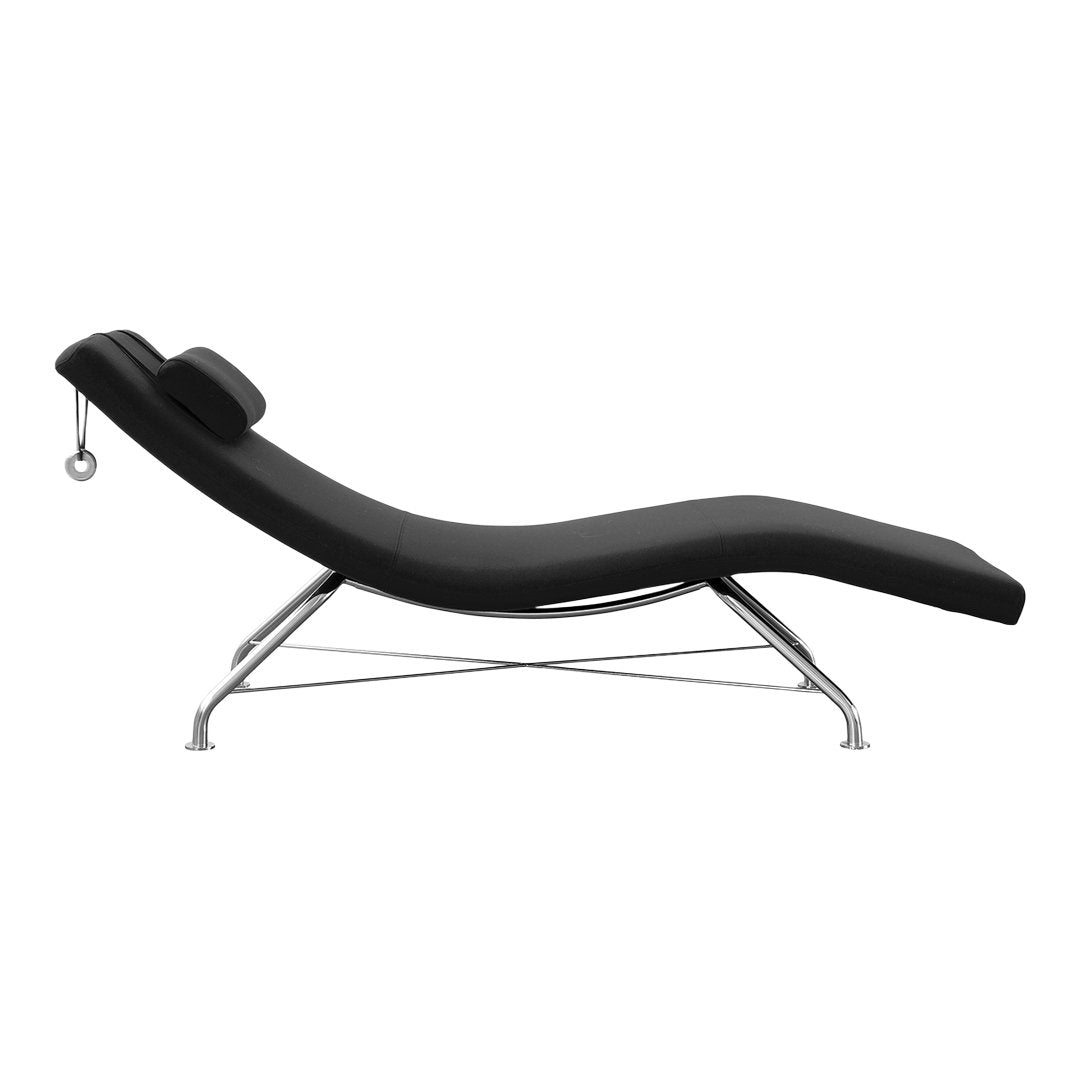 Sleek black chaise lounge with a smooth, contoured design and chrome legs, perfect for modern decor.