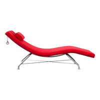 Vibrant red chaise lounge with smooth curves and sleek silver frame, perfect for modern decor.