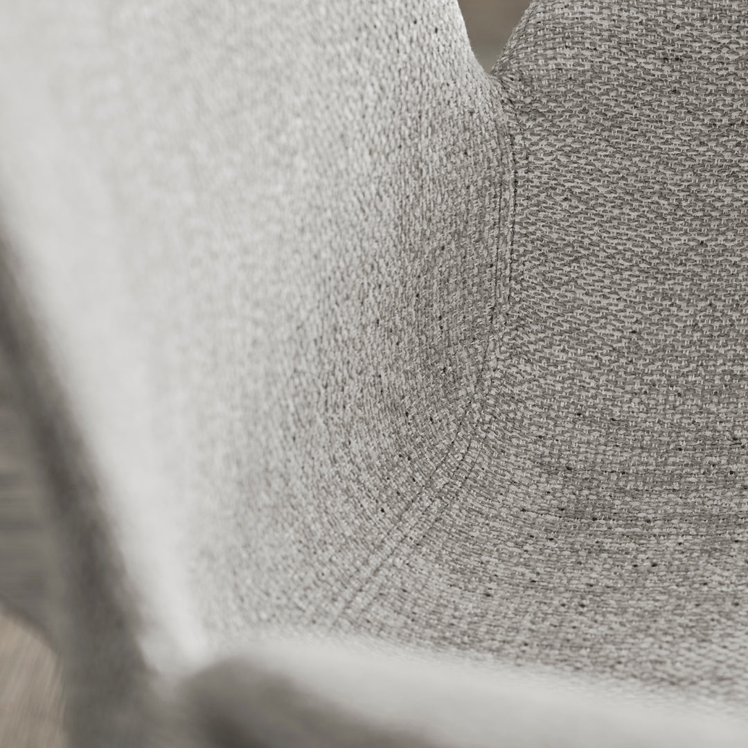 Close-up of soft, textured gray fabric with subtle pattern variations for a modern, elegant look.