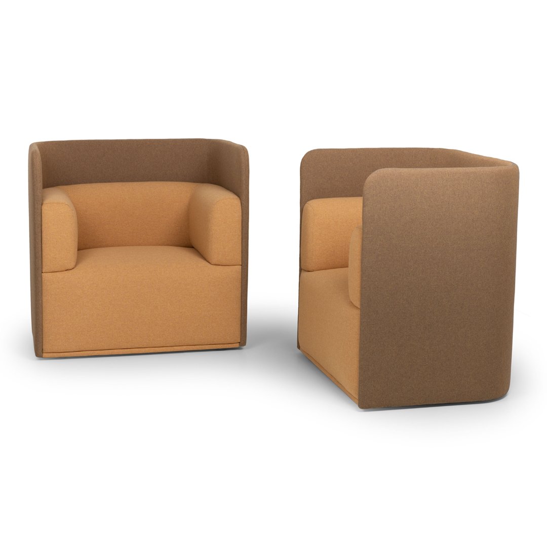 "Modern two-tone armchairs in warm beige and camel, featuring a sleek, minimalist design and smooth fabric upholstery."