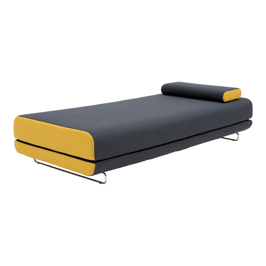 Modern gray sofa bed with vibrant yellow trim and a sleek, minimalistic design. Features a matching pillow.