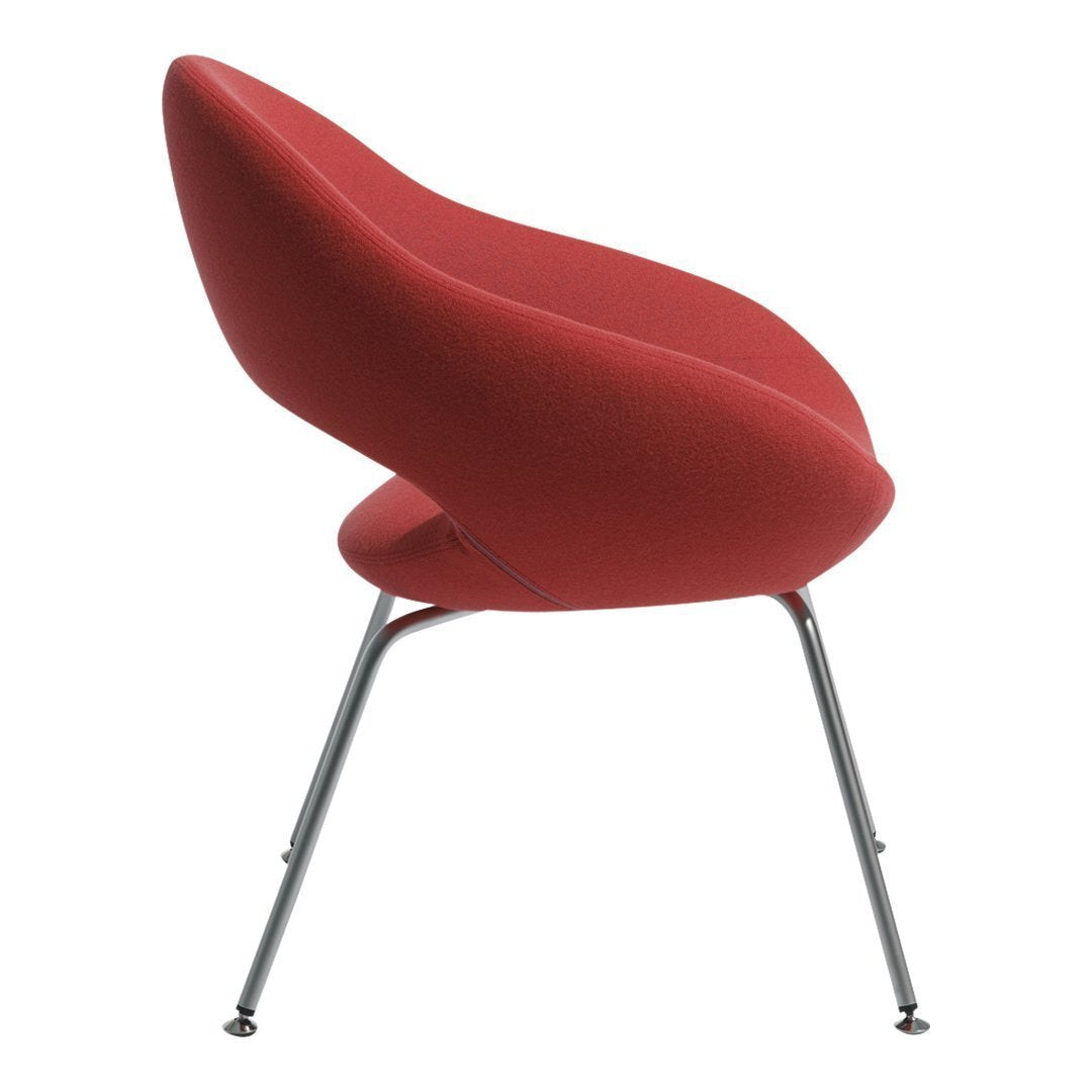Red upholstered chair with smooth curves and sleek chrome legs, ideal for modern decor.