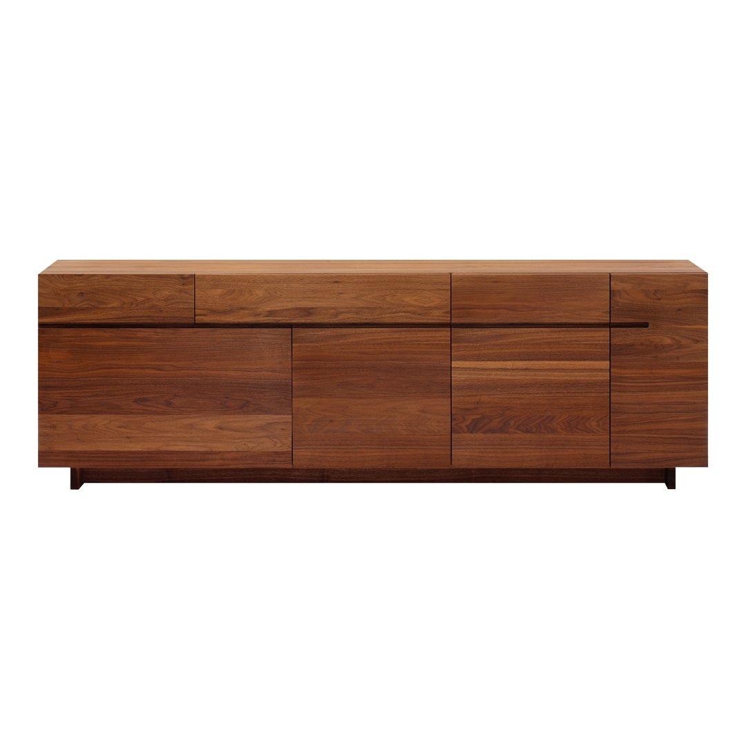 Modern walnut sideboard with a natural wood finish, featuring sleek lines and varying panel textures.