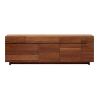 Modern walnut sideboard with a natural wood finish, featuring sleek lines and varying panel textures.