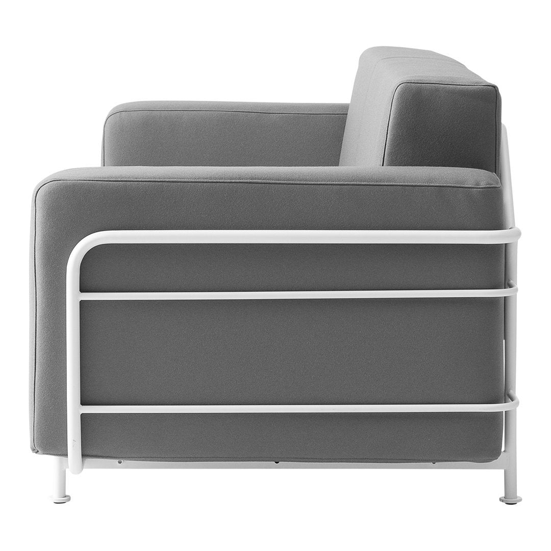 Grey upholstered armchair with a sleek white metal frame, featuring a modern minimalist design.