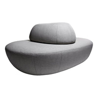 Modern gray sofa with a unique, curved shape and textured fabric pattern. Ideal for contemporary interiors.