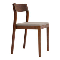 Solid walnut dining chair with a smooth cream fabric seat, showcasing a sleek, modern design. Perfect for any decor.