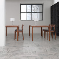 Modern wooden dining table and chairs in a neutral gray and brown color scheme, featuring a sleek minimalist design.