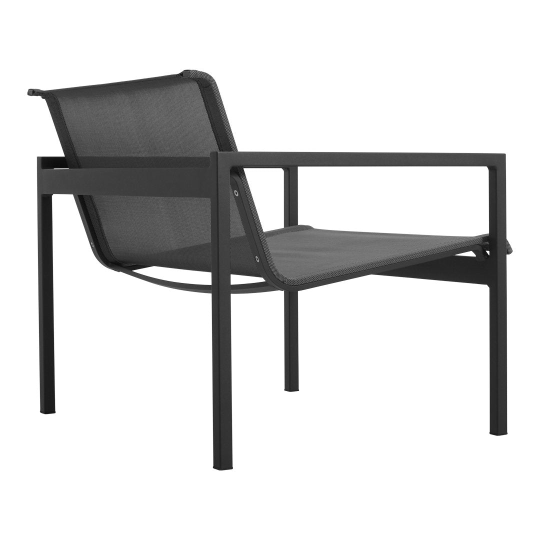 Black metal frame lounge chair with sleek mesh seating for a modern aesthetic. Minimalist design with clean lines.