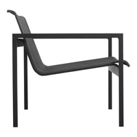 Modern black chair with a sleek, minimalist design and subtle woven texture on the seat and backrest.