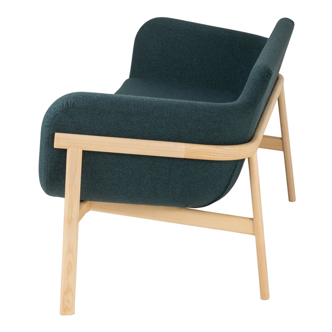 Teal upholstered chair with smooth, curved lines and light wooden legs, creating a modern, stylish look.