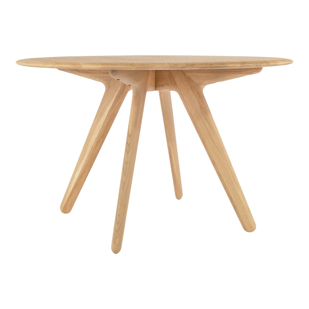 Natural wood round table with light oak finish and smooth surface, featuring minimalist design and tapered legs.