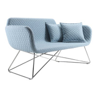Light blue sofa with a quilted pattern and two matching pillows on a sleek chrome base.