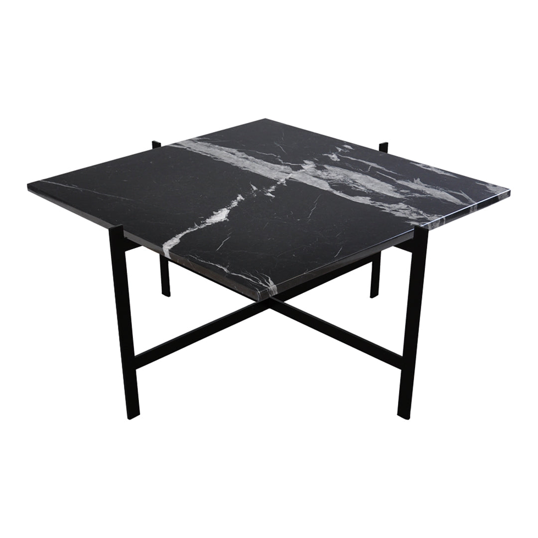 Black marble table with striking white veining and a minimalistic black metal frame. Elegant and modern design.