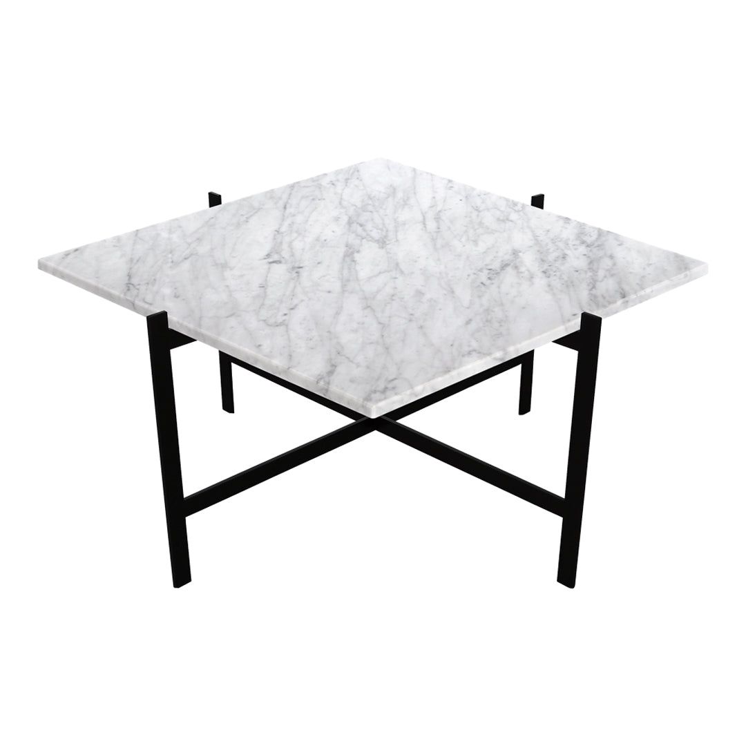 Square white marble table with a subtle gray veining pattern, set on a sleek black metal base.