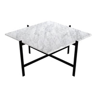 Square white marble table with a subtle gray veining pattern, set on a sleek black metal base.