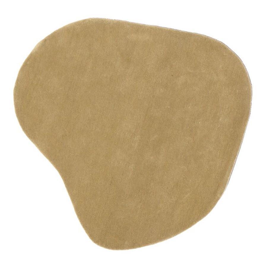 Soft beige abstract shape with a smooth, velvety texture. Ideal for modern decor or minimalist design.
