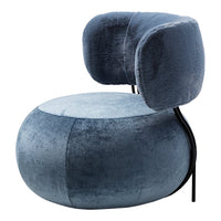 Blue velvet chair with rounded shape and textured upholstery, featuring a modern design and soft color variations.