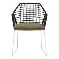 Black woven chair with green cushion and white legs, featuring a geometric pattern. Modern design for trendy decor.