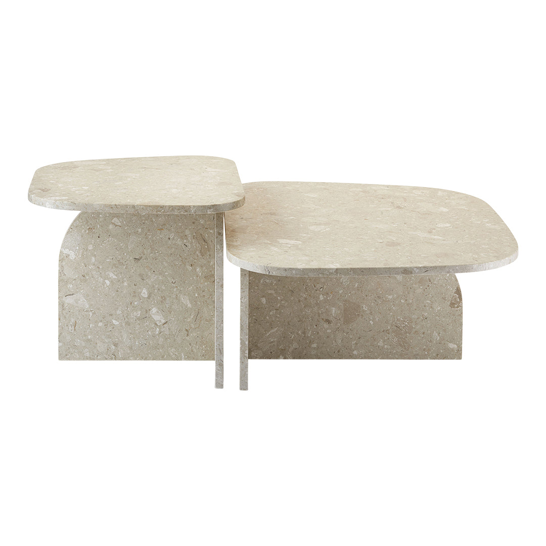 Light beige multi-textured coffee tables with smooth, rounded edges and a modern design.