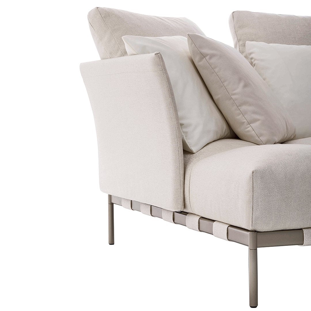 Light beige sofa with soft, plush cushions and sleek, minimalist design. Ideal for modern, airy interiors.