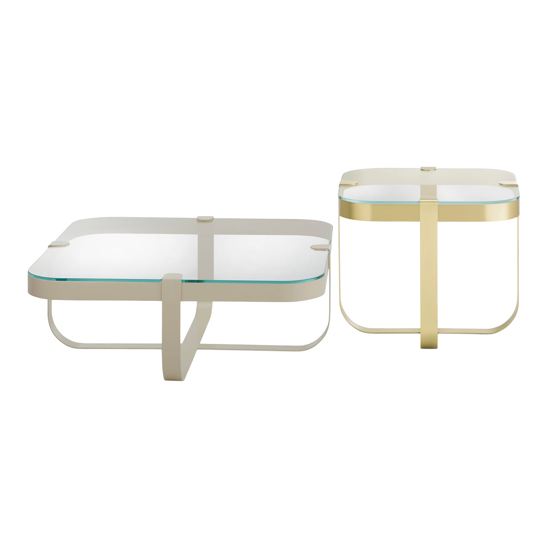 Set of two square coffee tables featuring a glass top with gold and white metal frames, sleek modern design.
