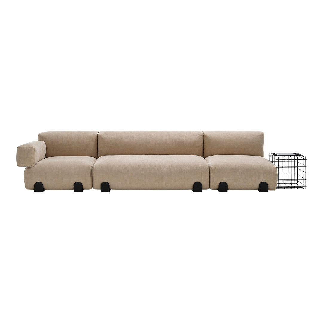 Minimalist beige sectional sofa with soft, textured upholstery and sleek black legs for a modern touch.