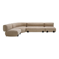 Curved beige sectional sofa with a soft textured fabric and black rolling feet, perfect for modern interiors.