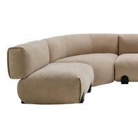 Curved beige sofa with smooth, minimalist design and subtle texture, perfect for modern living spaces.