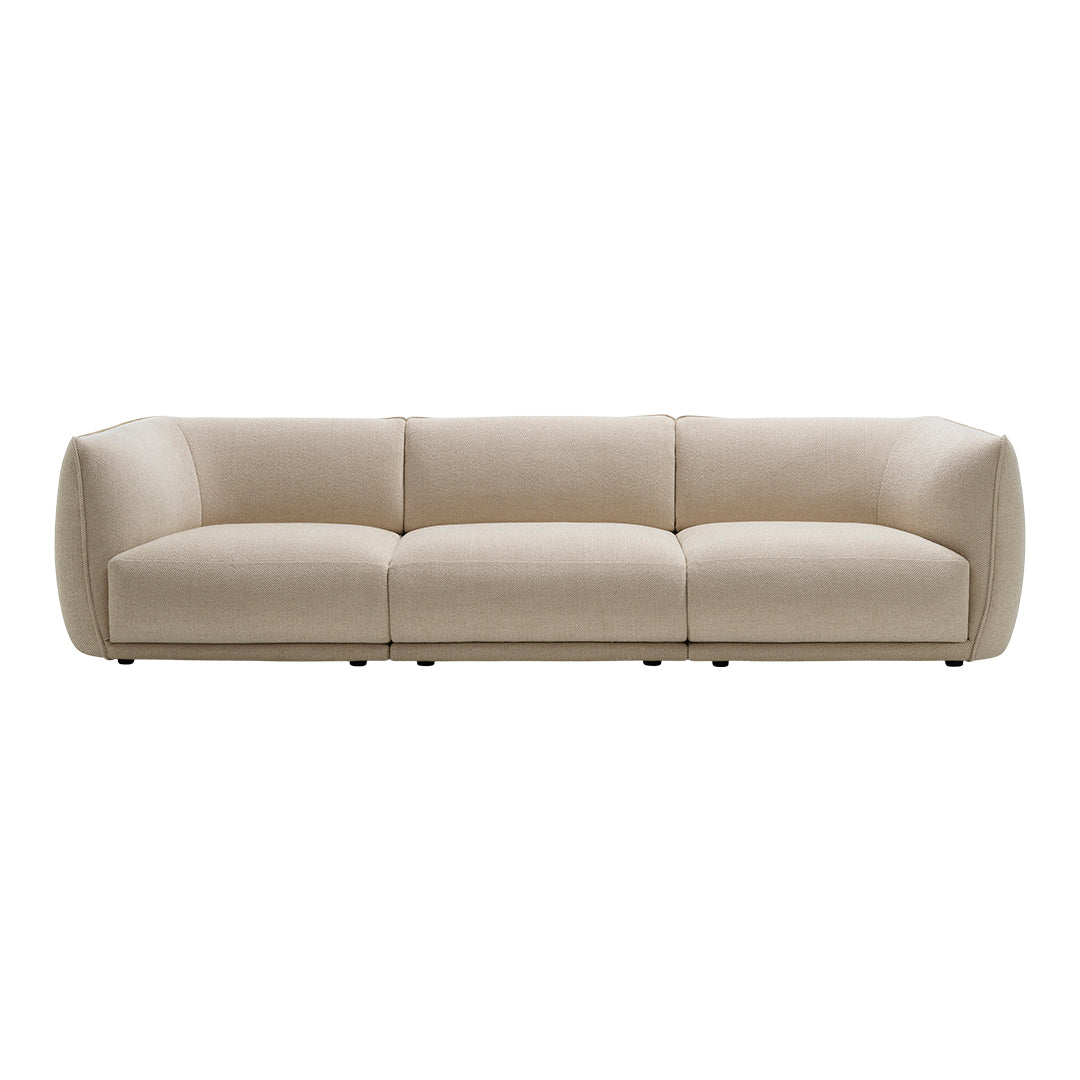 Beige fabric sofa with a minimalist design and smooth, rounded edges, perfect for modern living spaces.