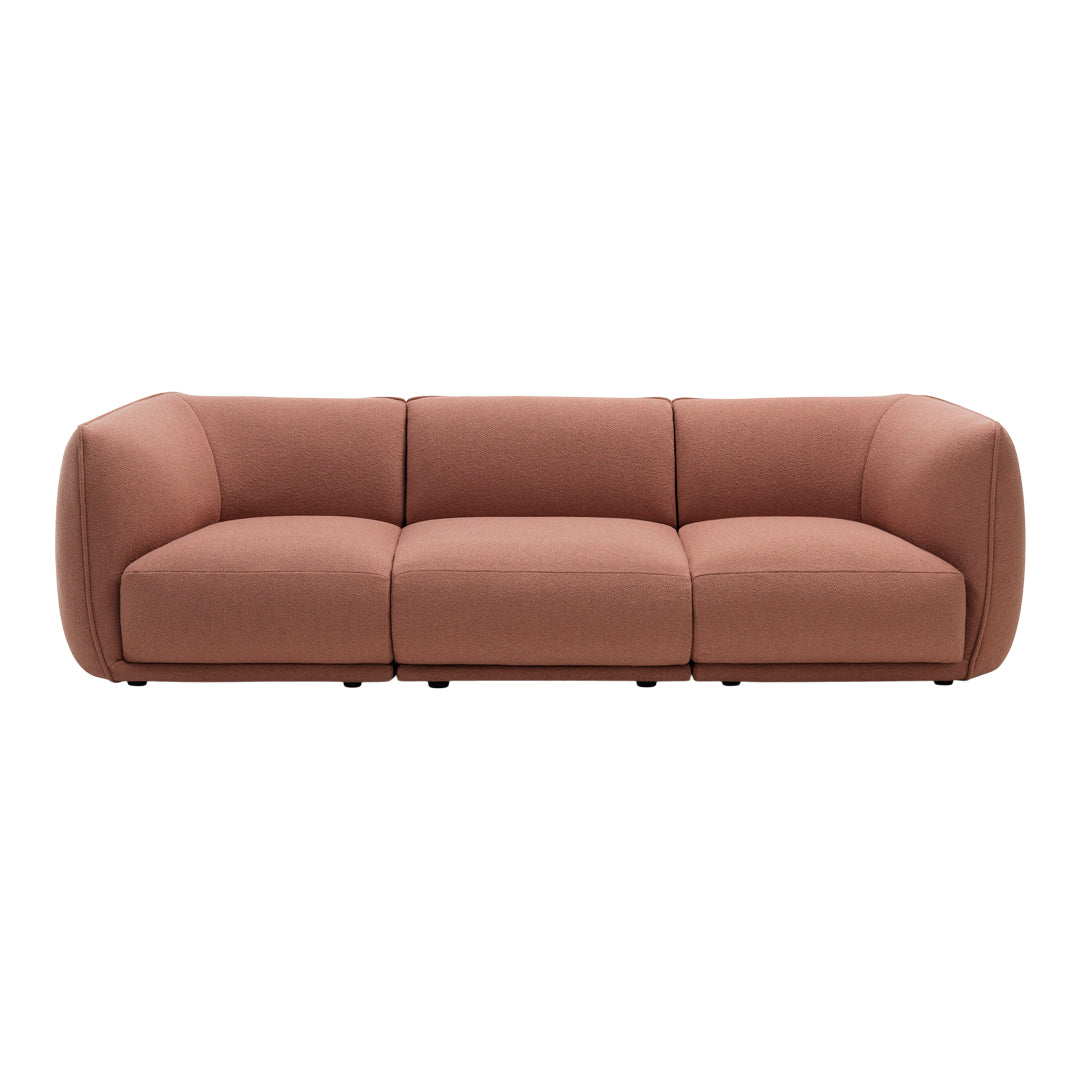 Soft terracotta sofa with smooth, rounded edges and a minimalist design. Perfect for modern interiors.