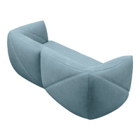 Stylish two-tone blue sofa with geometric patterns, featuring soft curves and textured fabric design.