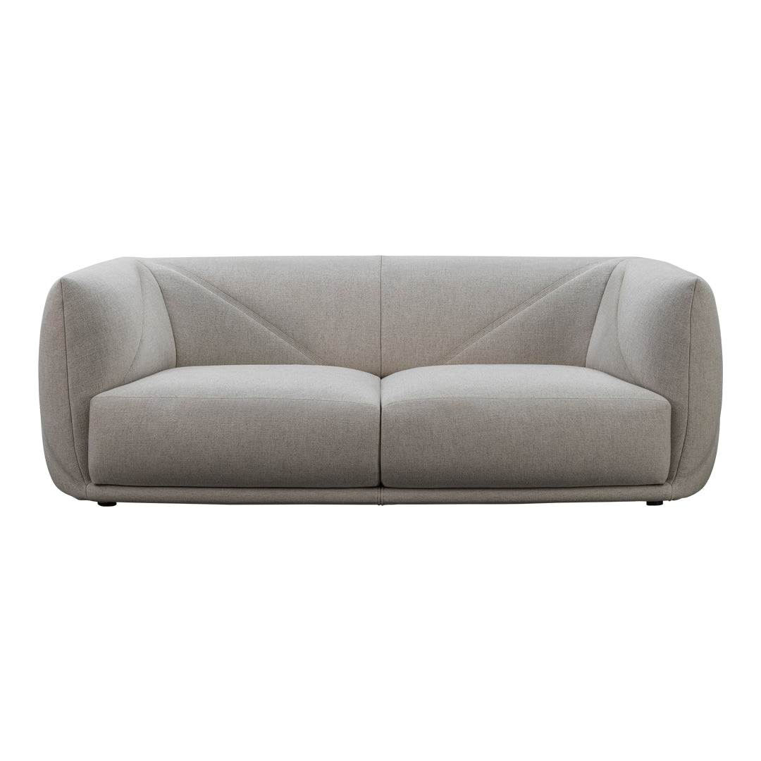 "Modern light gray sofa with a smooth texture and geometric pattern for contemporary living spaces."