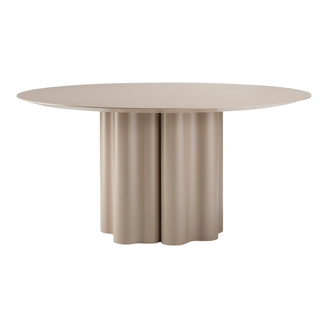 Round beige dining table with a pleated base, featuring a smooth circular top and textured architectural pattern.