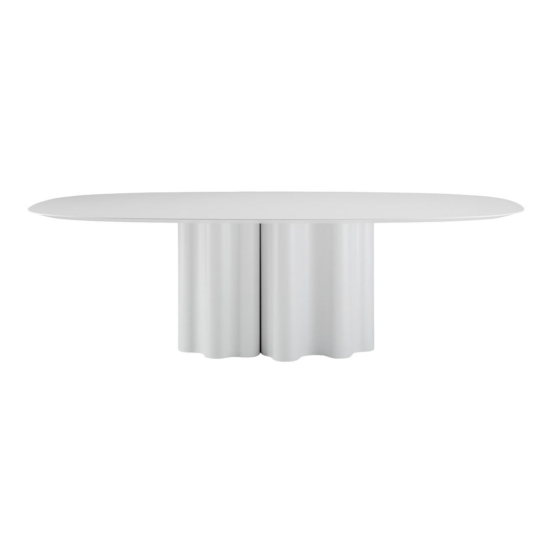Modern oval dining table in sleek white with a textured, wavy pedestal base. Perfect for contemporary interiors.