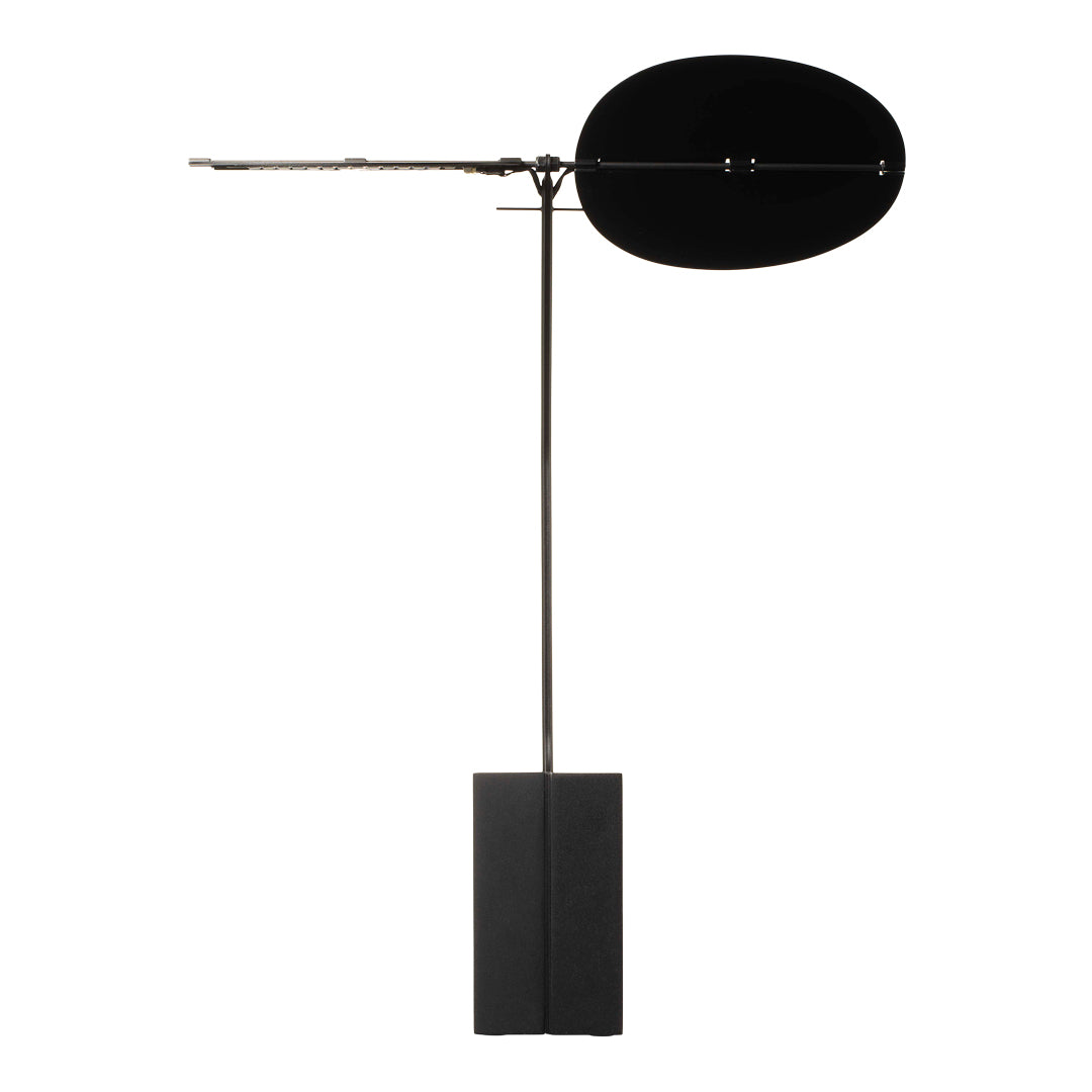 Black modern floor lamp with sleek, minimal design and smooth round shade, balanced on a rectangular base.