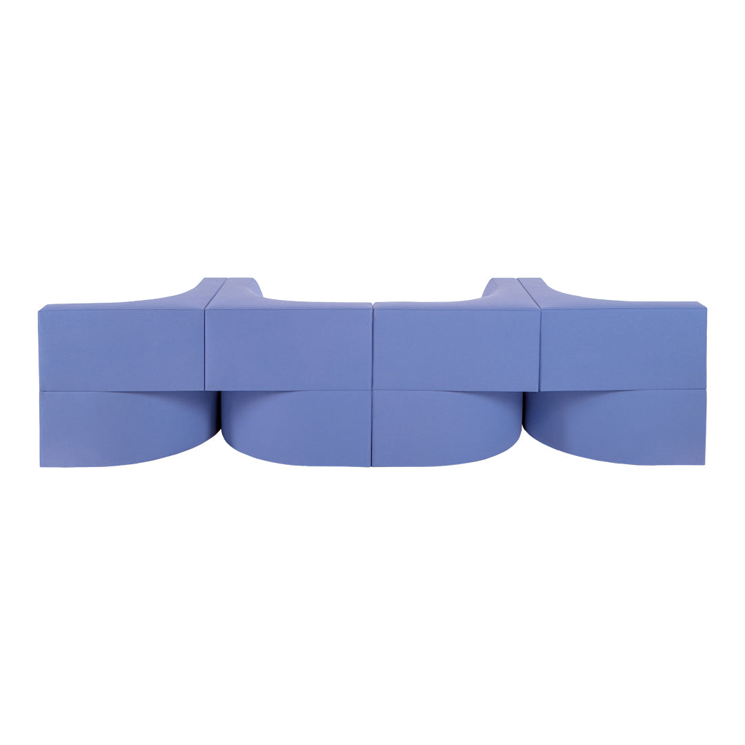 Modern blue foam sofa with curved geometric design for a stylish touch in contemporary interiors.