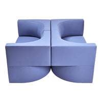 Modern two-piece sectional sofa in soft lavender with smooth, minimalist curves. Perfect for contemporary decor.