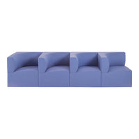 Stylish modular sofa in soft purple with minimalist design and smooth, rounded edges. Perfect for modern decor.