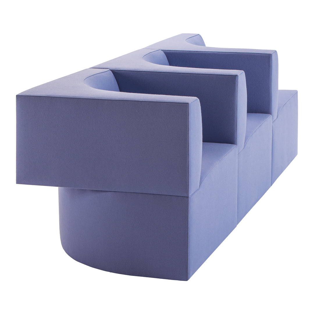 Contemporary blue sofa with geometric design and smooth, soft texture, perfect for modern interiors.