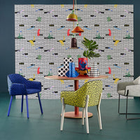 Colorful wallpaper with bold patterns featuring red boats, yellow birds, and black and white geometric designs.