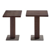 Dark wood side tables with sleek, square tops and matching cylindrical bases, featuring subtle grain patterns.