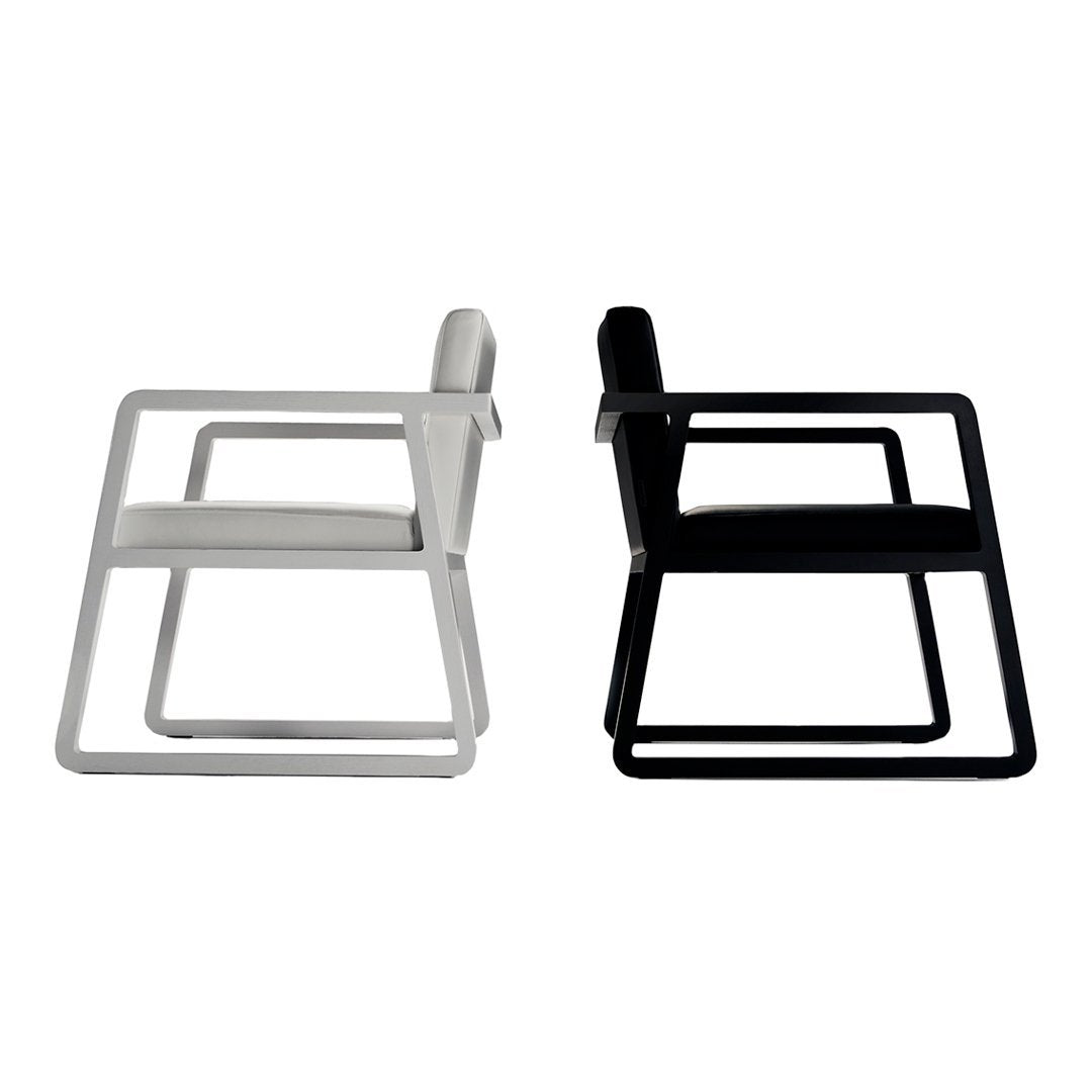 Black and white modern chairs with sleek metal frames and minimalist designs. Ideal for contemporary spaces.